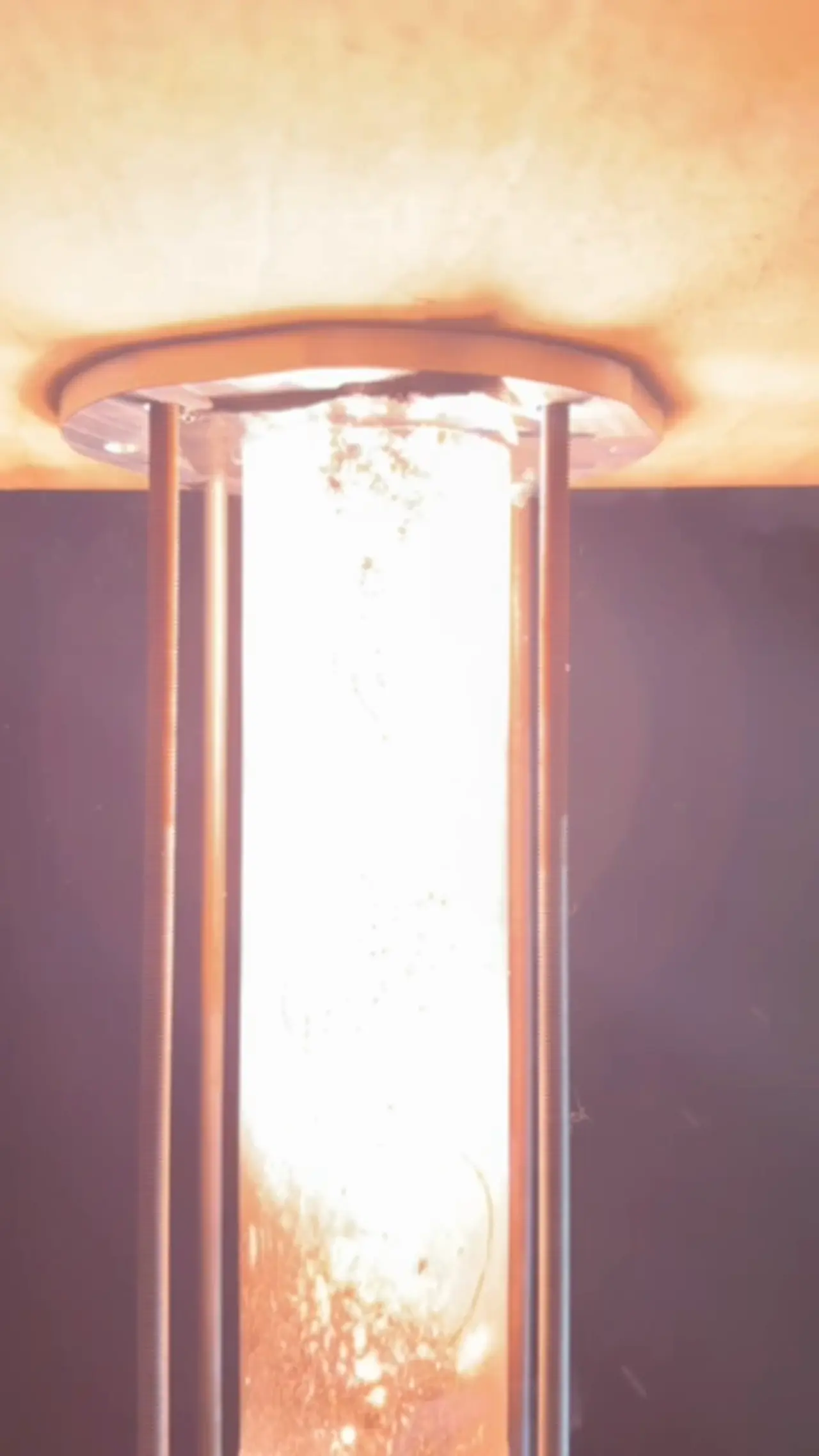 GAR-E igniter firing inside a clear chamber-length test fixture