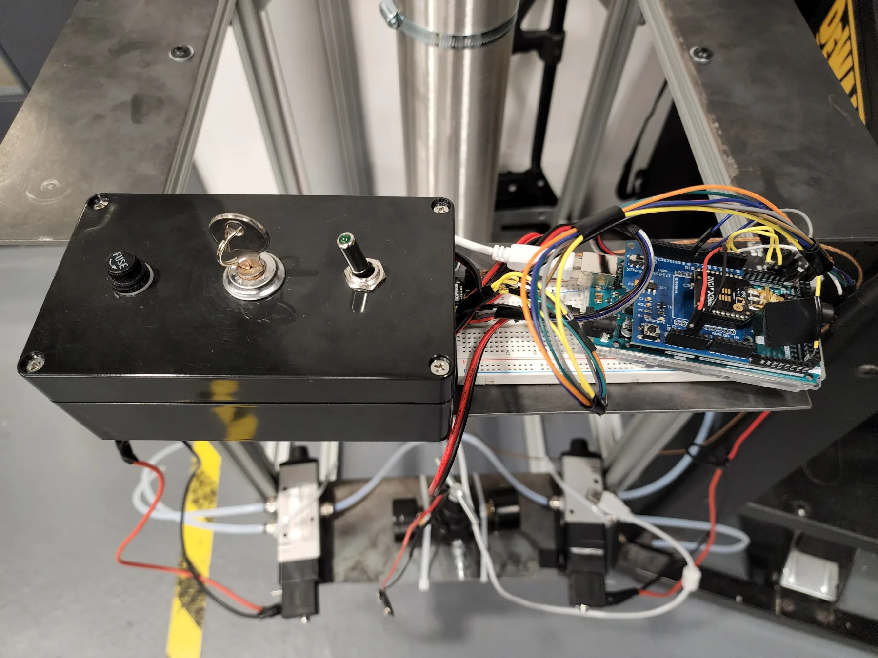 Manual control box and Arduino-based valve-control hardware mounted above the Borealis valves
